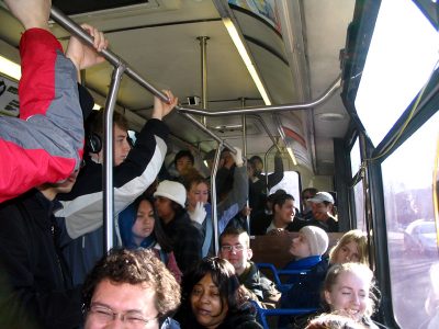 Crowded bus in Champaign-Urbana, IL. Benjamin Stone | Flickr
