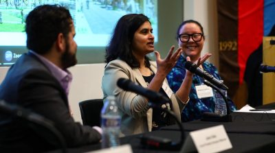 Jason Delia, Pallavi Shinde, and Sheena Collum speaking at the event