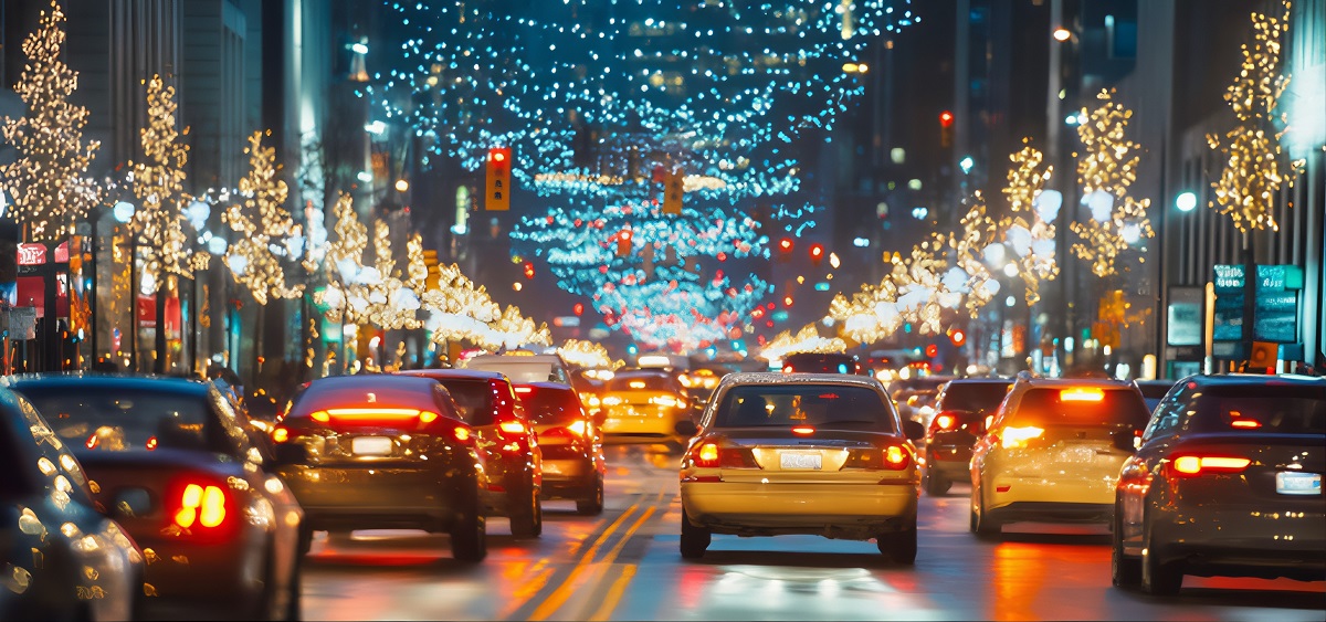 Busy traffic road decorated with Christmas and new year lights. Busy traffic city street filled with traffic jam, congestion