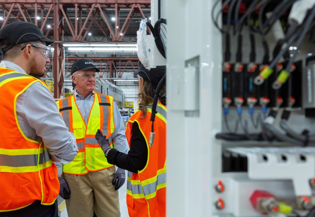 Kevin Corbett touring a transit facility.