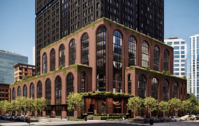 Rendering of Morgan Street Development. The lower floors feature a brick facade with vegetation and outdoor space.