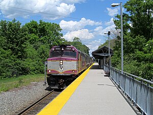 Outbound train on the Kingston Line. It is approaching a station.