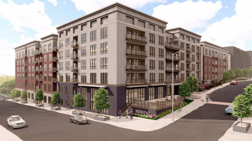 Rendering of Arrive KC. It is a large development with ground floor retail on a corner of a block.