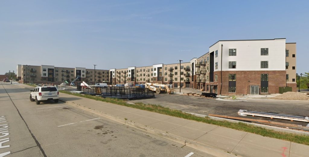 Station 250 in July 2024 as it neared completion. Behind the development is the Metra transit station.