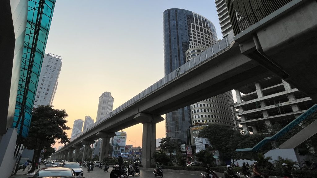 The Hanoi Metro Line 2A with skyscrapers surrounding the elevated rail.
