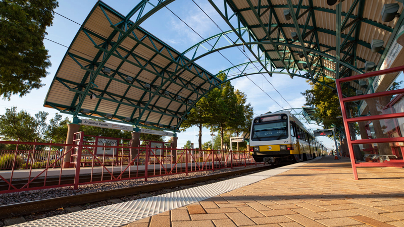 View from the Arapaho Center station platform as a DART train approaches.