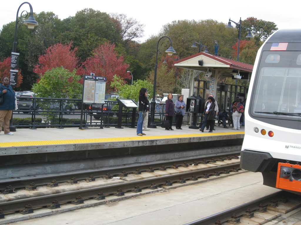 Riders waiting to board a River Line train.