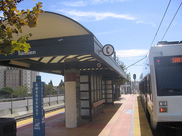 Tamien Station in San José, California with a light rail train waiting for riders to board.