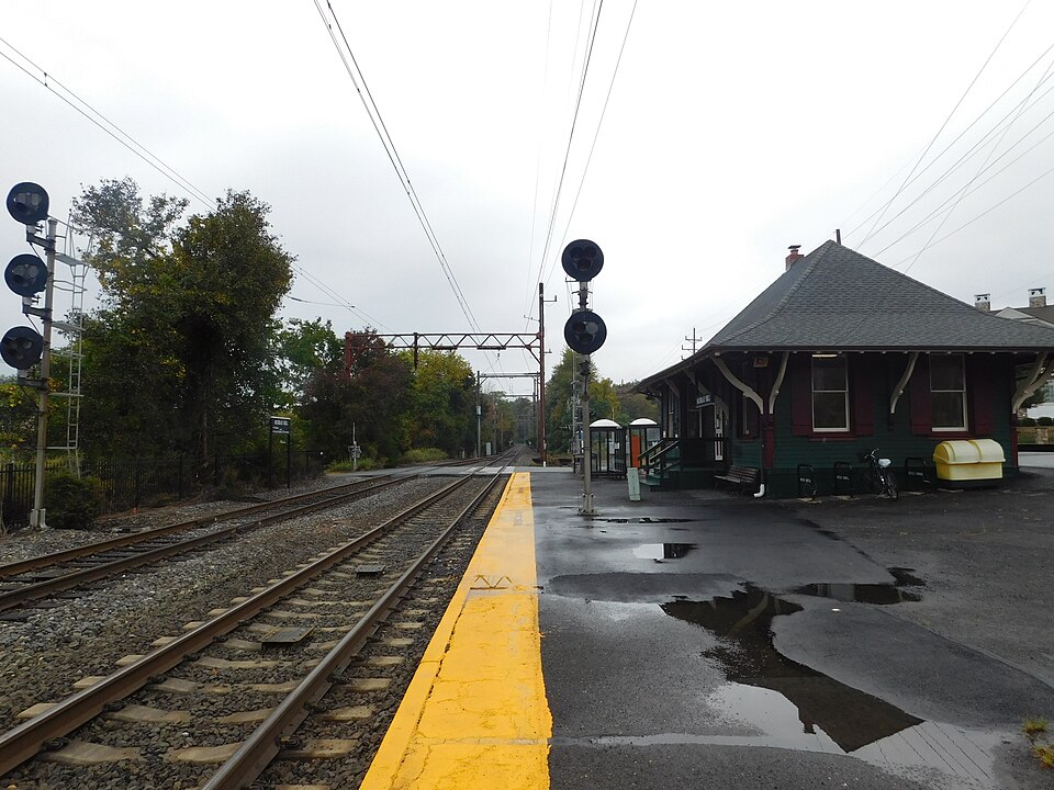 An empty Murray Hill Station on a rainy day.