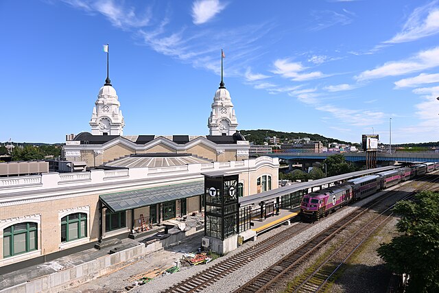 Aerial view of Worcester Union Station as a train waits to board passengers.