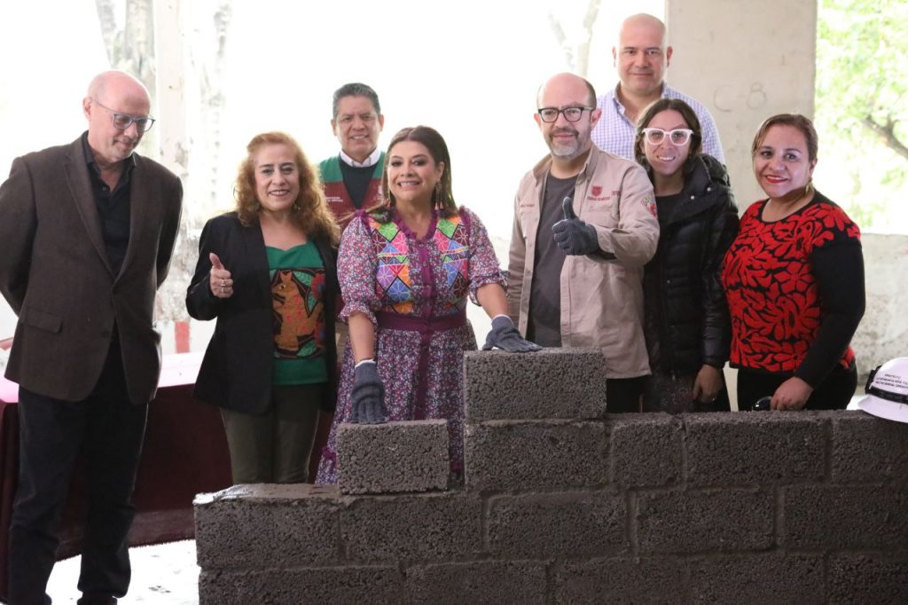Mayor Clara Brugada participates in a bricklaying ceremony. Courtesy of the City of Mexico City