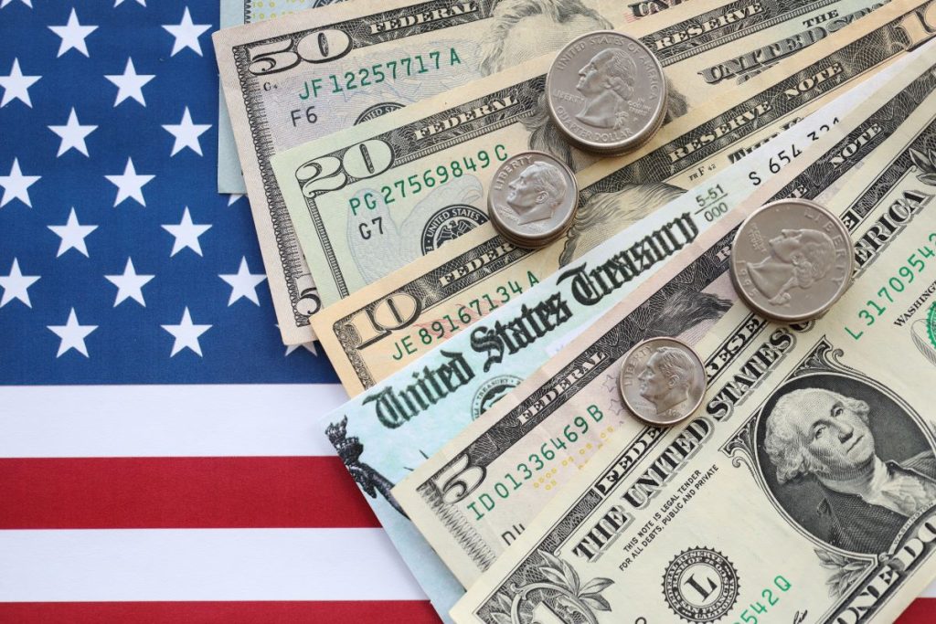 US Currency over flag