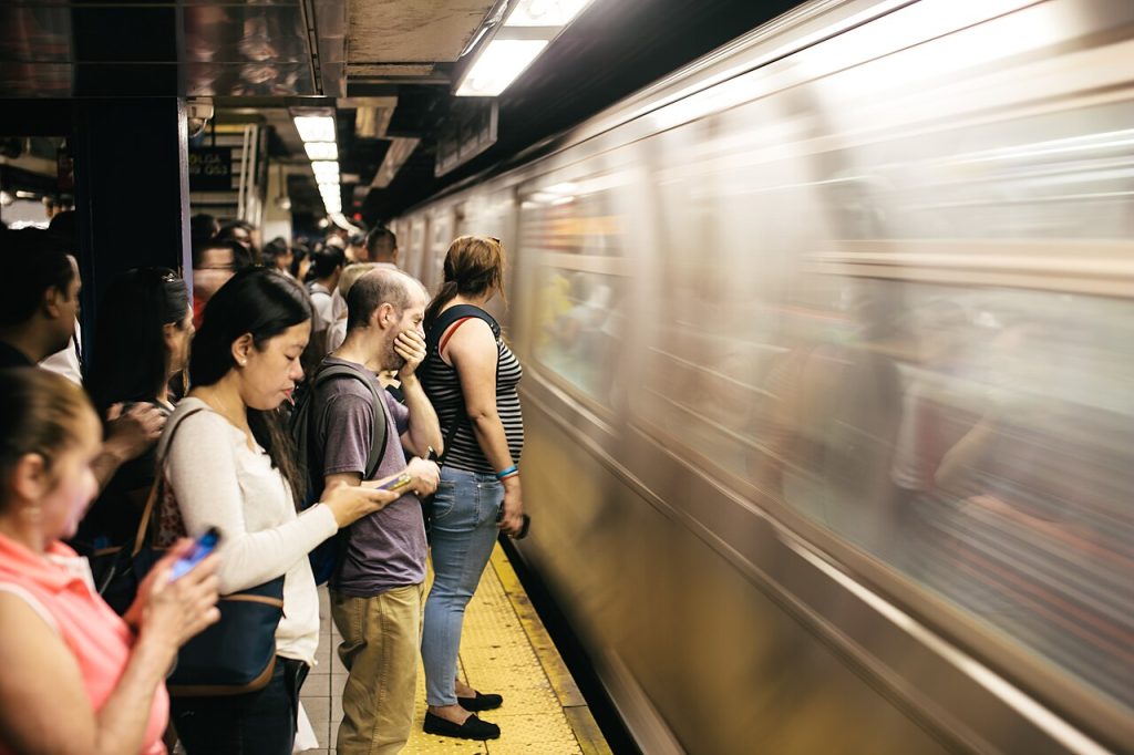 Passengers waiting on rail platform