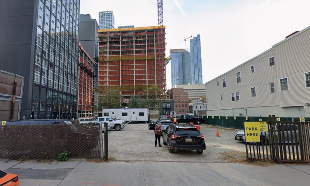 Former parking lot and future site for development.