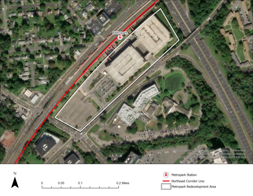 Aerial view of the Metropark Redevelopment Area before redevelopment, showing the Northeast Corridor and Metropark Station. The location was mostly parking lots.