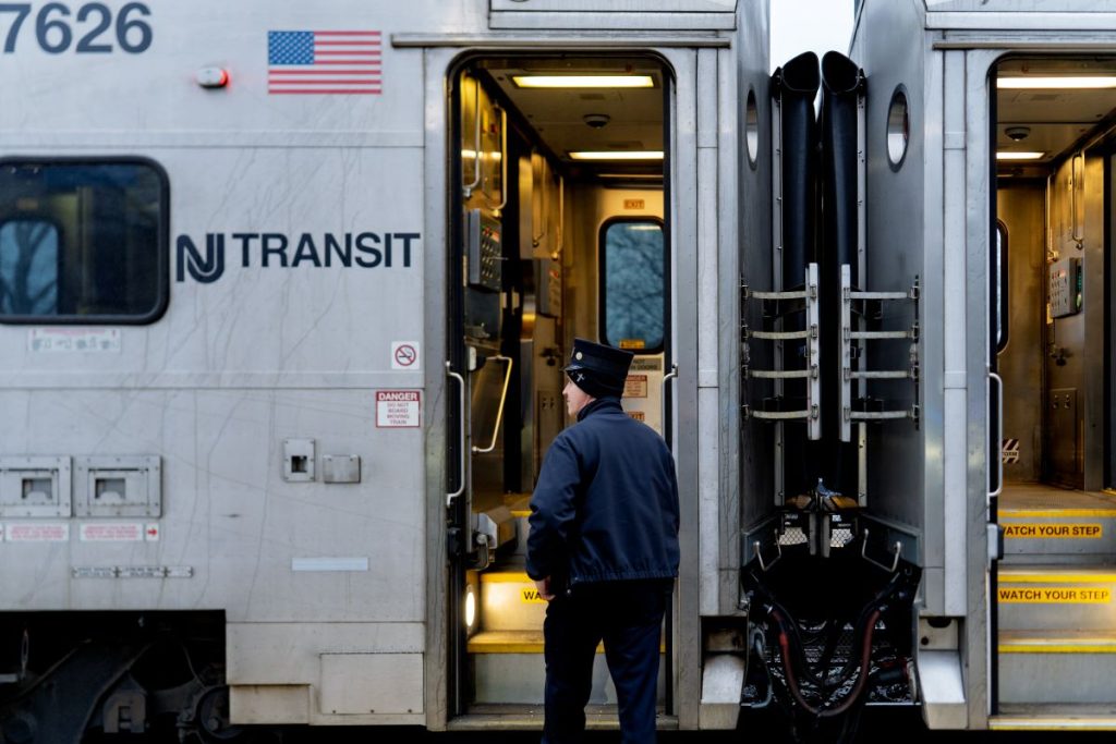 NJ TRANSIT worker in front of a train at Ramsey Station