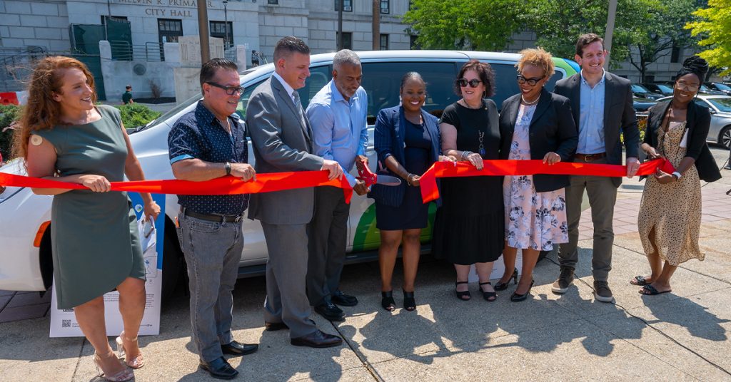 Camden officials celebrating the launch of the Camden Loop microtransit in 2023.