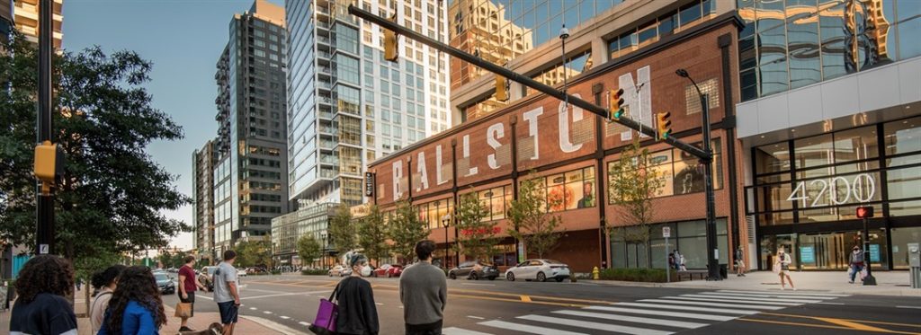 Ballston in Arlington, Virginia. There is an industrial warehouse converted into a modern commercial building.