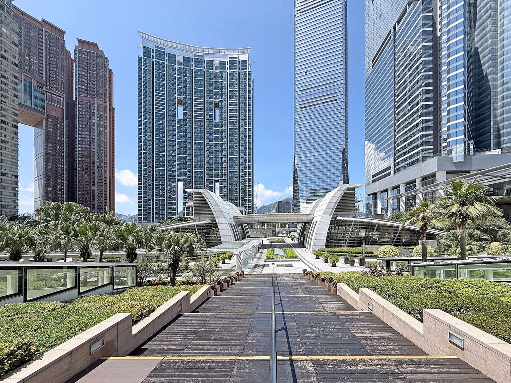 Kowloon Station Podium. Six large towers surround the station.