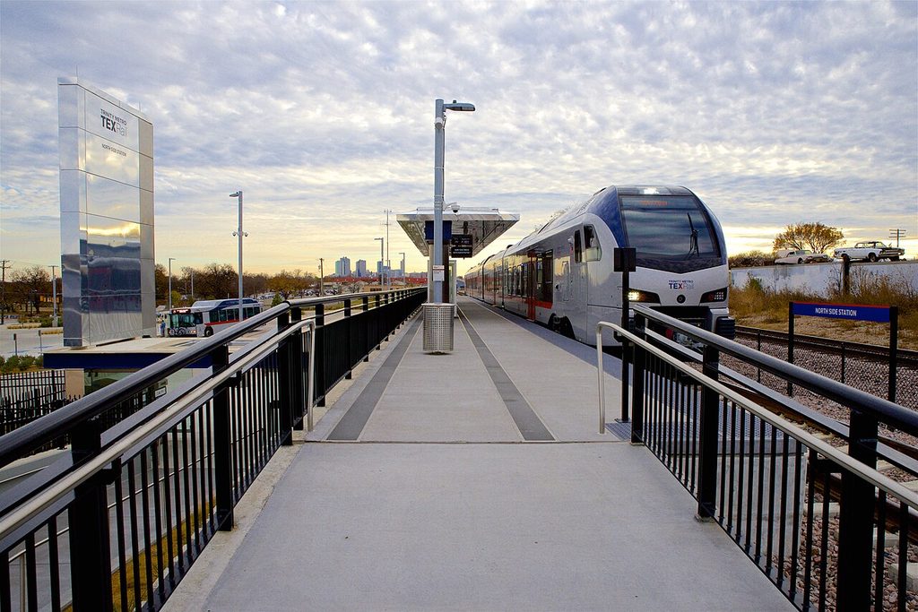 The platform at Northside station and a TEXRail train